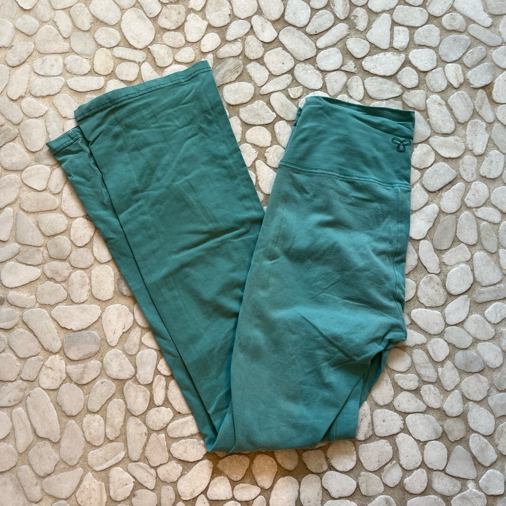 Teal green Aritzia TNA high-waisted flare leggings